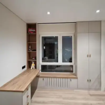 Шкаф со столом у окна в детскую